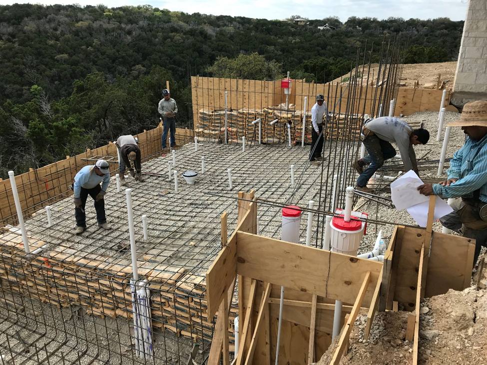 A group of people working on the ground.