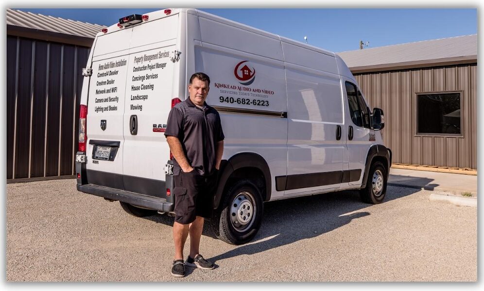 A man standing in front of a van.