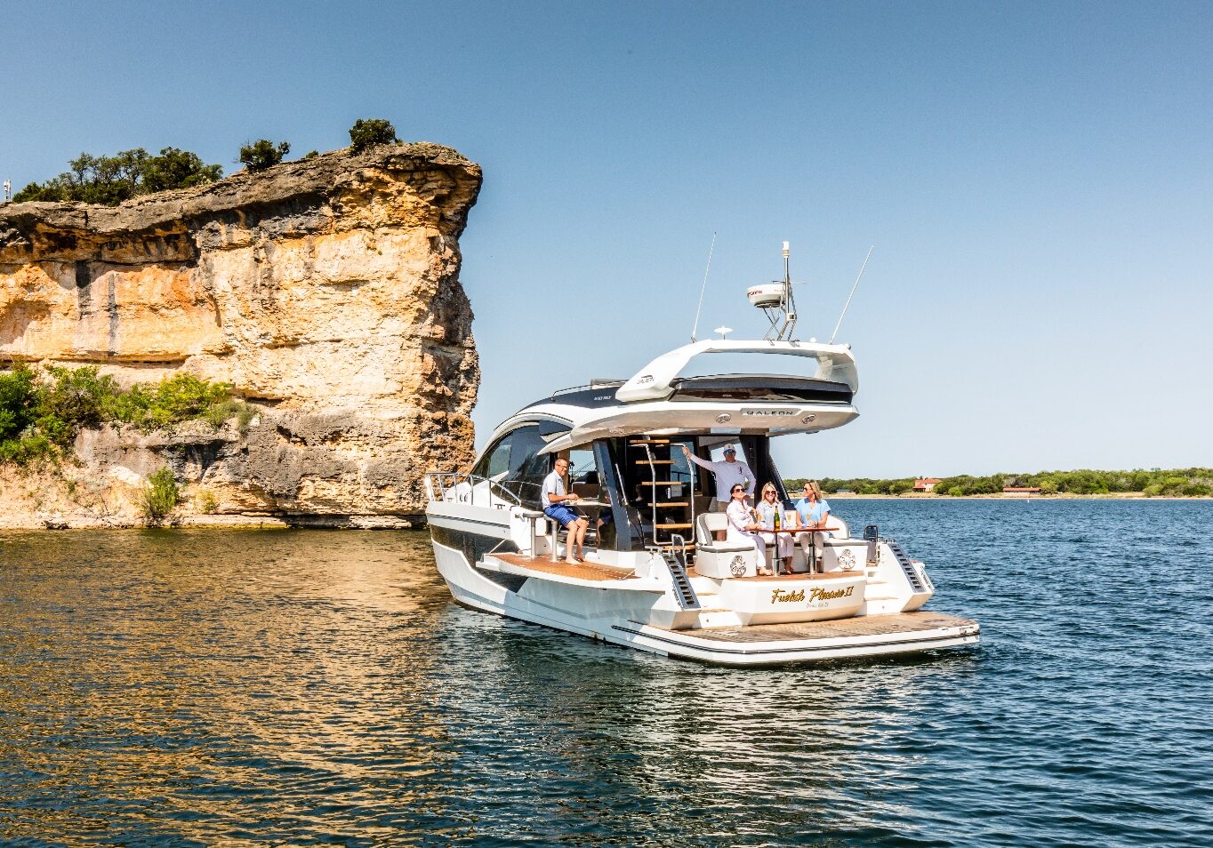 A boat with people on it in the water.