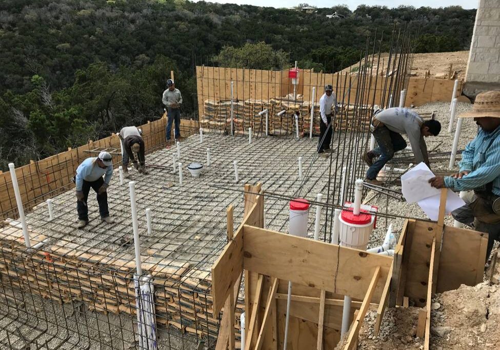 A group of people working on the ground.